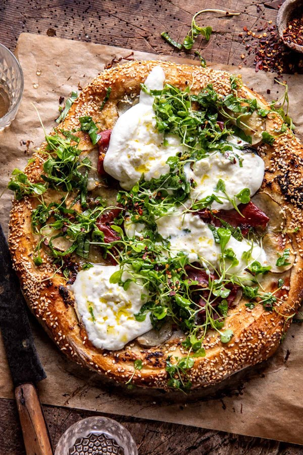 Pesto potato prosciutto pizza