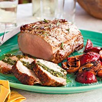 Pesto-rubbed pork roast with grilled fruit