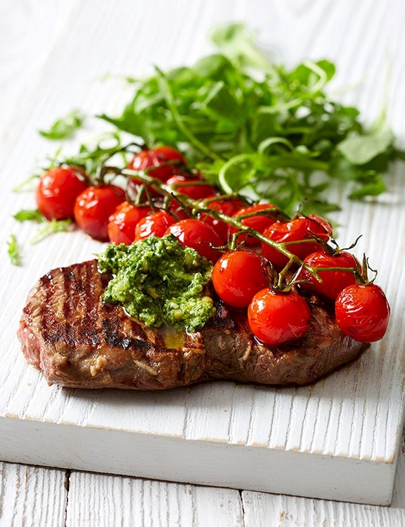 Pesto steak with balsamic tomatoes