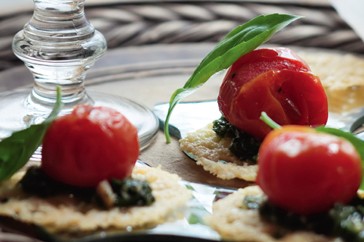 Pesto tomatoes on Parmesan crisps