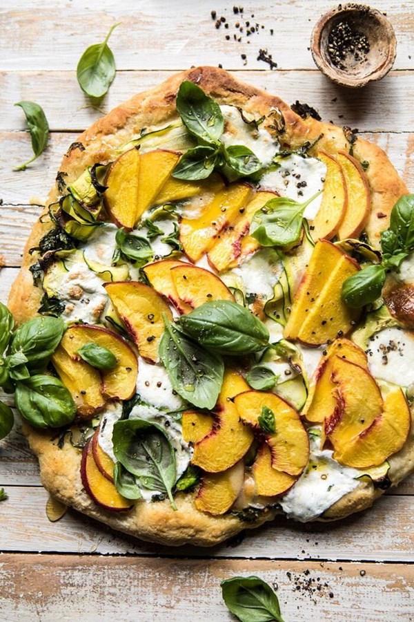 Pesto zucchini and peach pizza with burrata