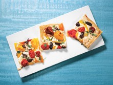 Phyllo pizza with smoked mozzarella and cherry tomatoes