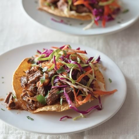 Picadillo tostadas with vegetable slaw