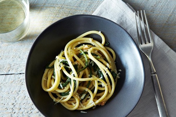 Pici pasta with dandelion greens