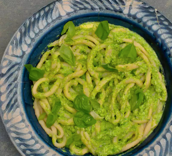 Pici pasta with pea and ricotta sauce