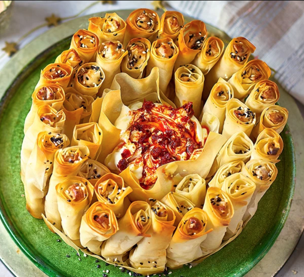 Pick & dip filo straws with feta, dates and sesame seeds