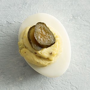 Pickle and  jalapeño deviled eggs