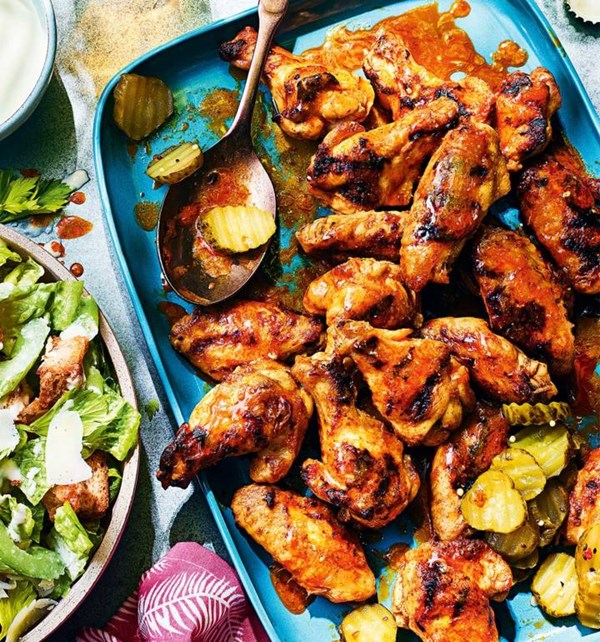 Pickle-brined Buffalo wings with blue Caesar