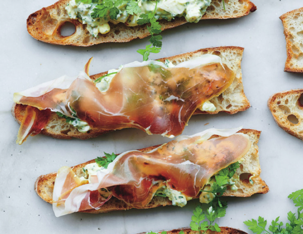 Pickled egg salad crostini with serrano ham
