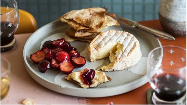 Pickled plums with washed rind cheese