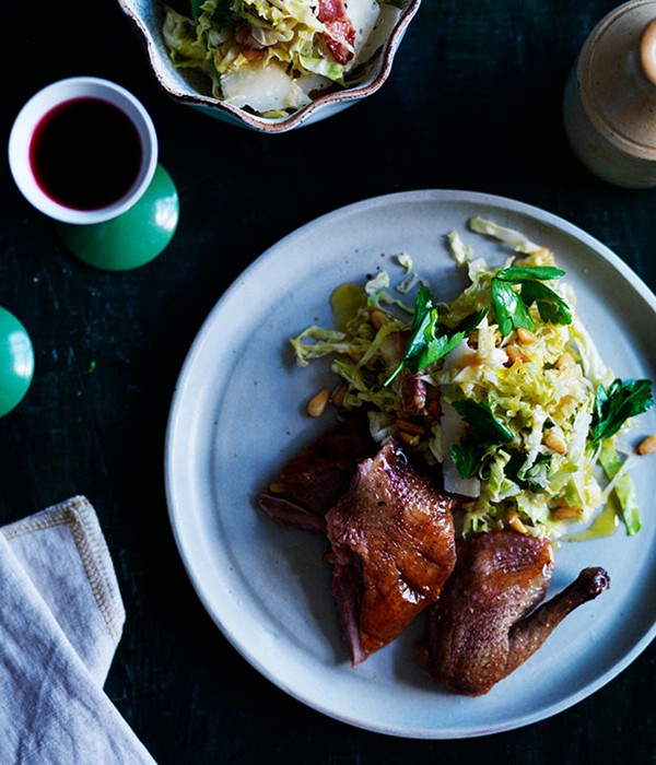 Pigeon with bacon, cabbage and pine nut salad