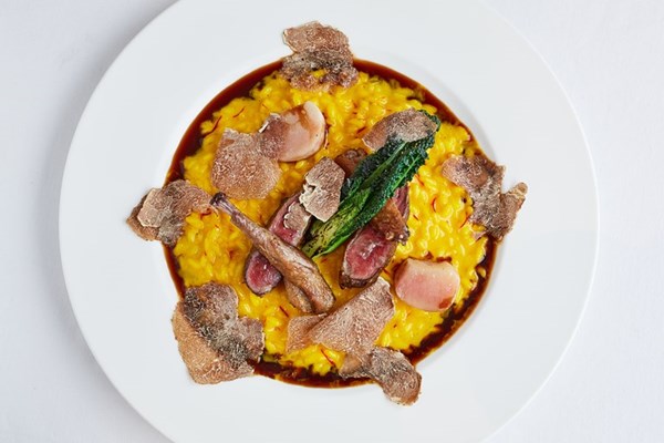  Pigeon with saffron risotto and cavolo nero