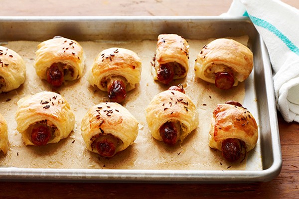 Pigs-in-a-blanket with sauerkraut and mustard