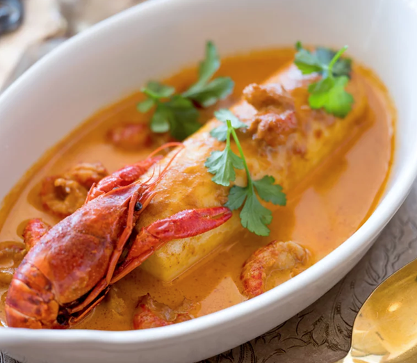 Pike quenelles in crayfish sauce