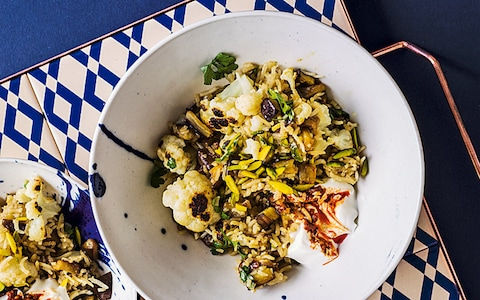 Pilaf of aubergine, cauliflower and dates with harissa yogurt
