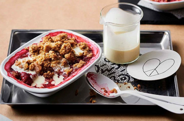Pimm's and berry crumble with macadamia and cream