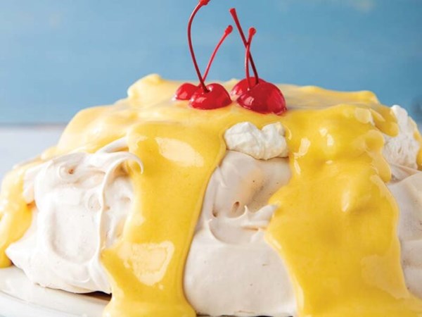 Piña colada Pavlova [coconut rum whipped cream; pineapple curd]