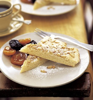 Pine nut torta with Marsala-poached autumn fruit