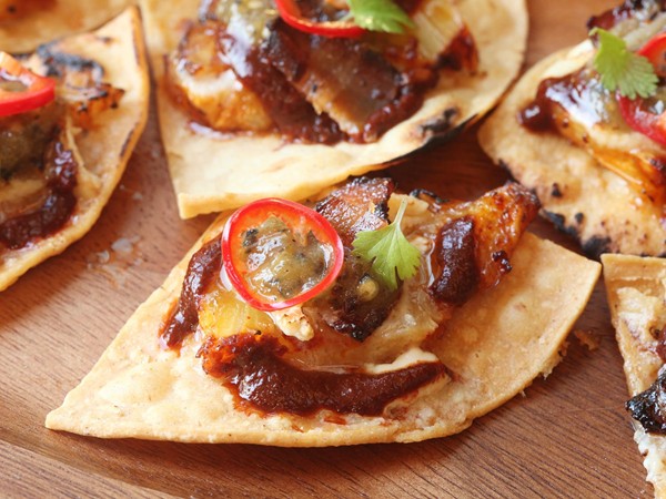Pineapple and bacon nachos with Brie and chipotle-orange salsa