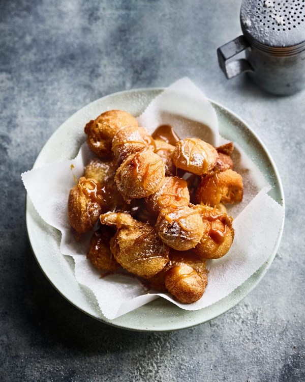 Pineapple and clotted cream fritters with salted caramel sauce 