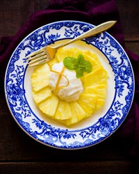 Pineapple carpaccio with lemon sorbet and candied zest