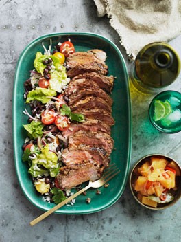 Pineapple-jerked pork neck with crushed pineapple relish and black bean and rice salad