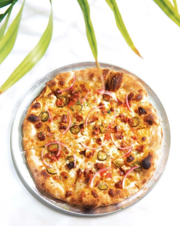 Pineapple pizza al pastor-style