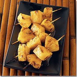 Pineapple skewers with brown butter and orange juice glaze