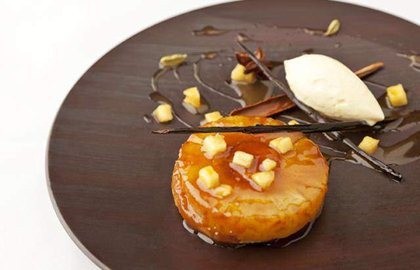 Pineapple upside-down cake, spiced rum caramel, and Devonshire clotted cream