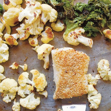 Pinhead oat-crusted catfish, roasted cauliflower and mustard greens, and lemon cream