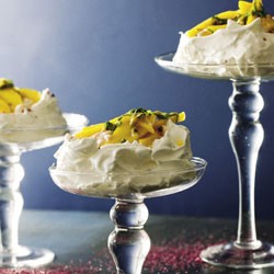 Pink peppercorn meringues with mango and mint salad and guava cream