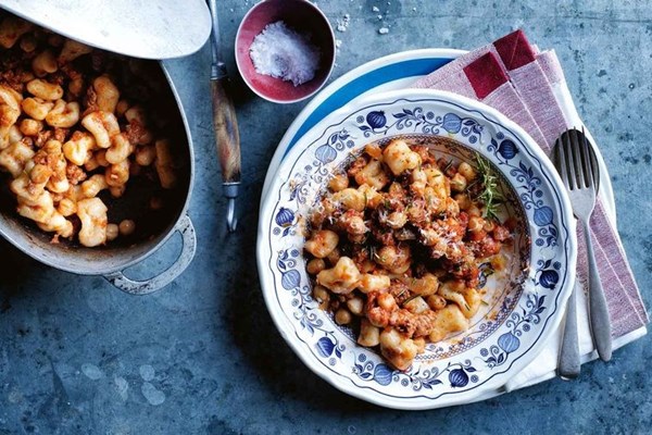 Pisarei pasta with braised chickpea and sausage 