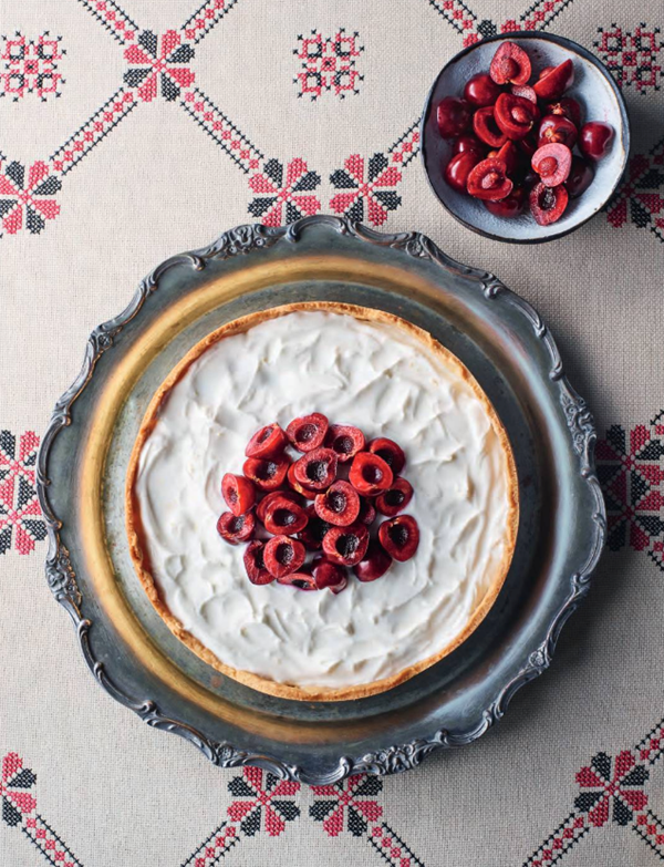 Pistachio and rose water tart with yogurt and cherries