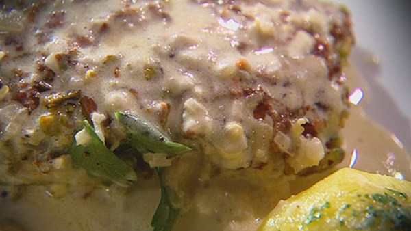 Pistachio crusted fillet of cod with shallot, lemon and crème fraîche sauce