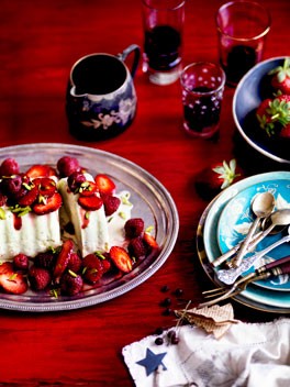 Pistachio ice-cream cake with red summer berries