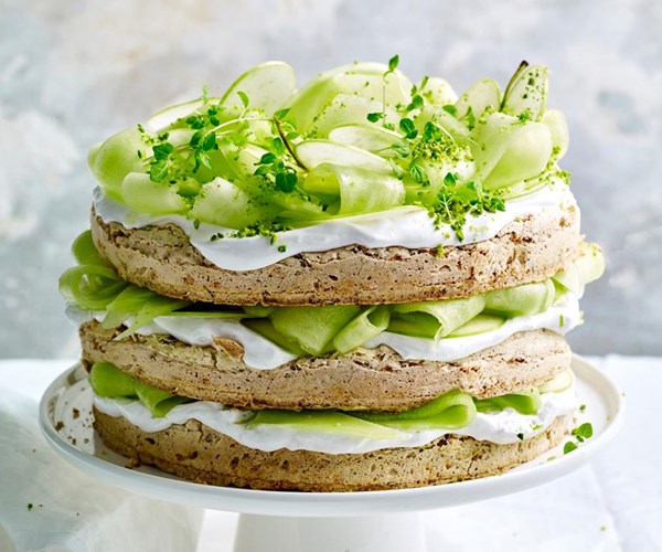 Pistachio, lime and coconut cream cake with melon, apple and mint