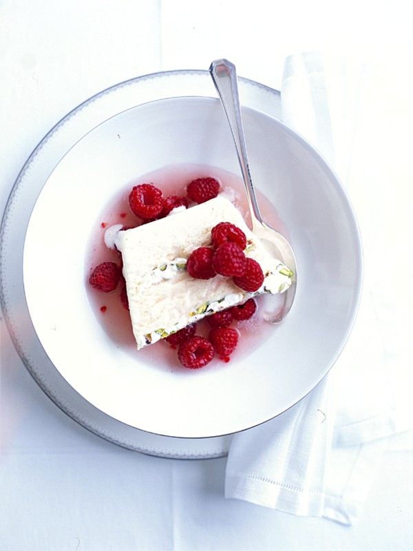 Pistachio nougat semifreddo with marinated raspberries