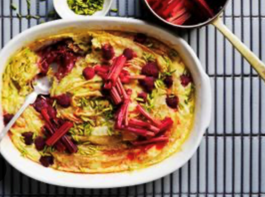 Pistachio, rhubarb and rose ruffled milk pie