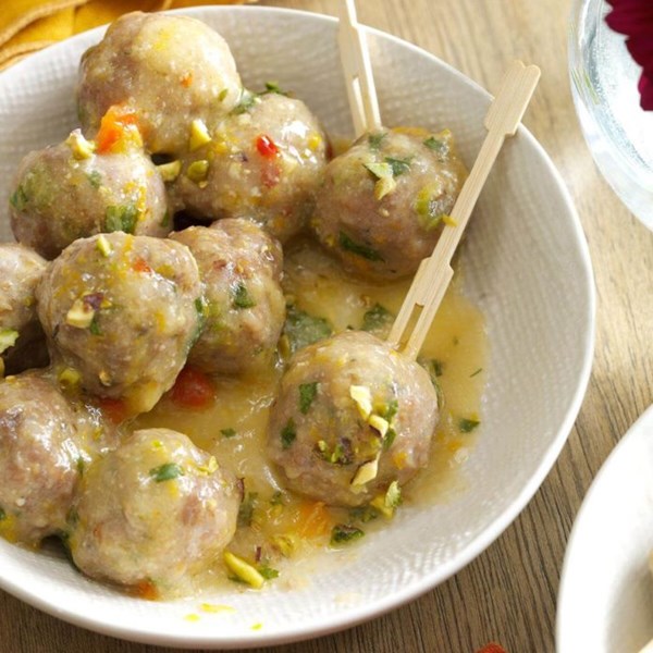 Pistachio-turkey meatballs in orange sauce