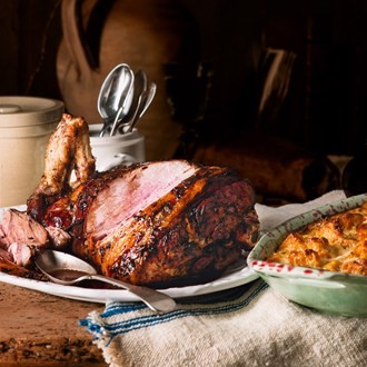 Pistou-stuffed leg of lamb with pumpkin gratin