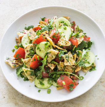 Pita bread salad with tomatoes and cucumber (Fattoush)