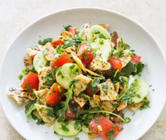 Pita bread salad with tomatoes and cucumbers (Fattoush)