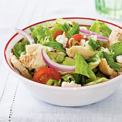 Pita salad with tomatoes, cucumber, and herbs