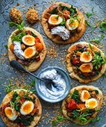 Pittas with dukkah-coated quail eggs, chickpea and chorizo salad and mint yoghurt dressing