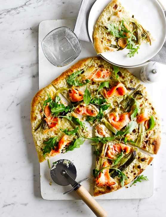 Pizza bianca with smoked salmon and spring onions