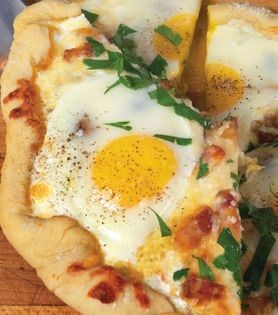Pizza bianco with bacon and eggs