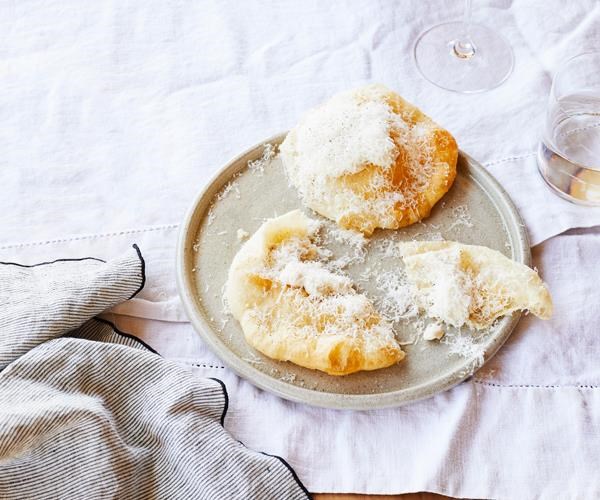 Pizza fritta with bagna cauda and Parmigiano-Reggiano