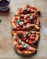 Pizza with baked meatballs