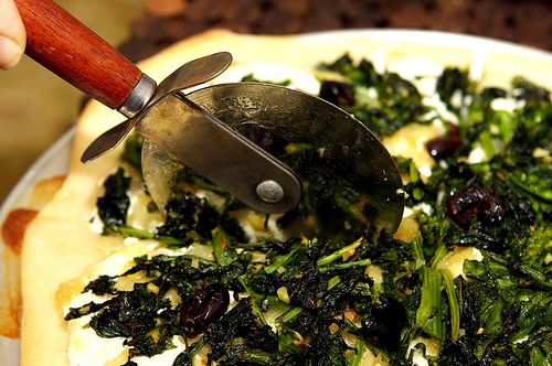 Pizza with broccoli rabe and roasted onions