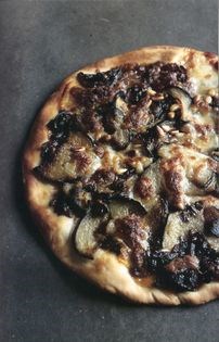 Pizza with caramelized onions, eggplant, anchovies, and mozzarella cheese